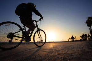 biker riding at sunset/dusk